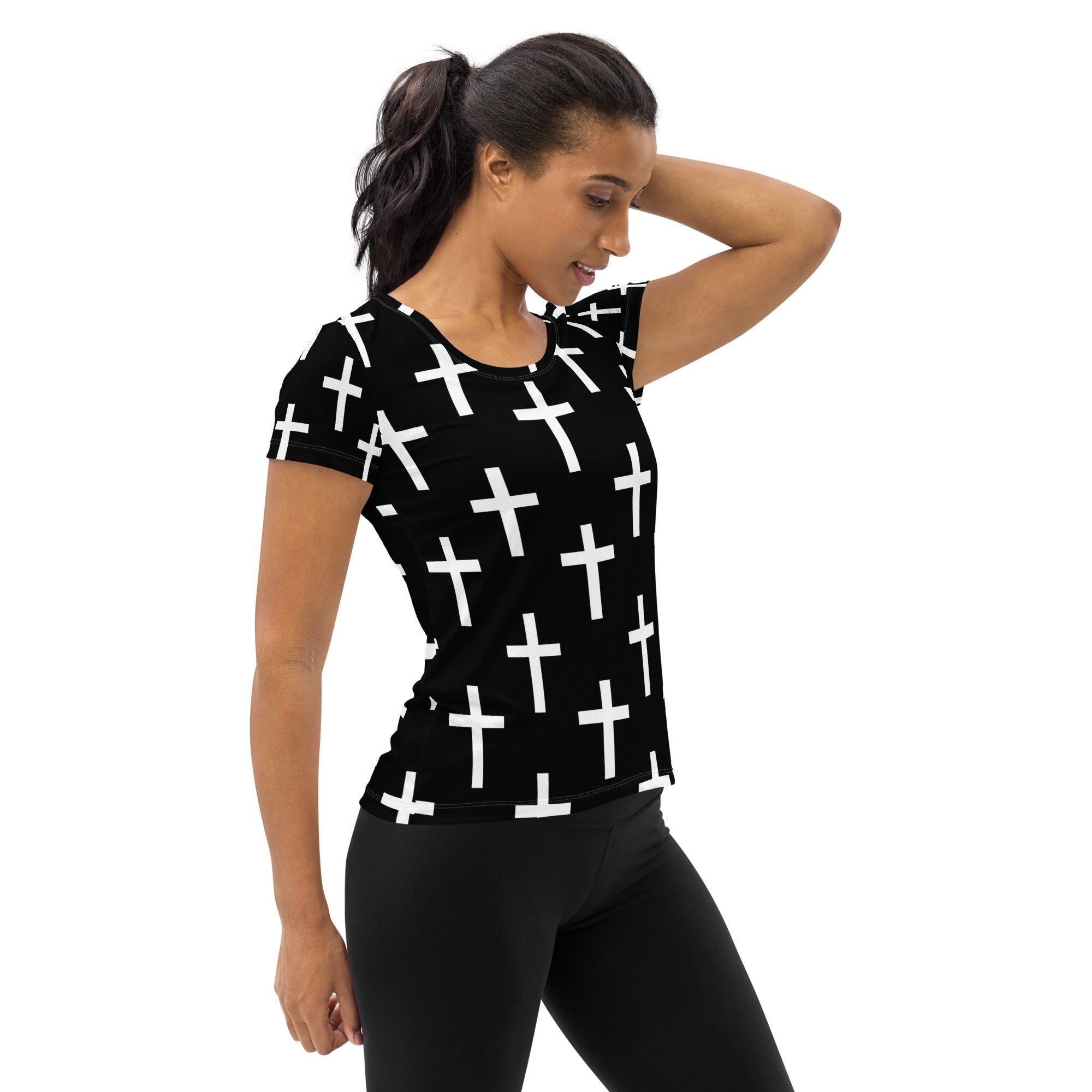Women's Stretch Fit Athletic Sports T-shirt in black and white cross print, showcasing its form-fitting design and soft fabric.