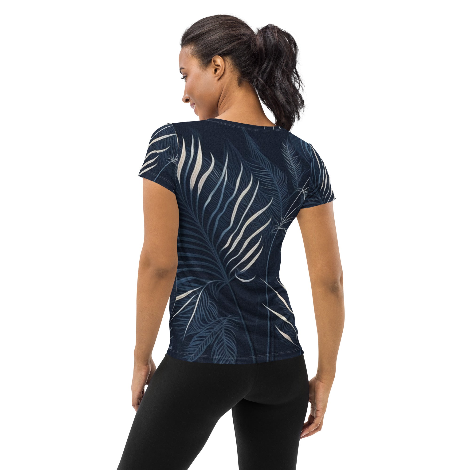 Women's Stretch Fit Athletic Sports T-shirt in blue and white palm leaves design, showcasing its soft fabric and athletic silhouette.