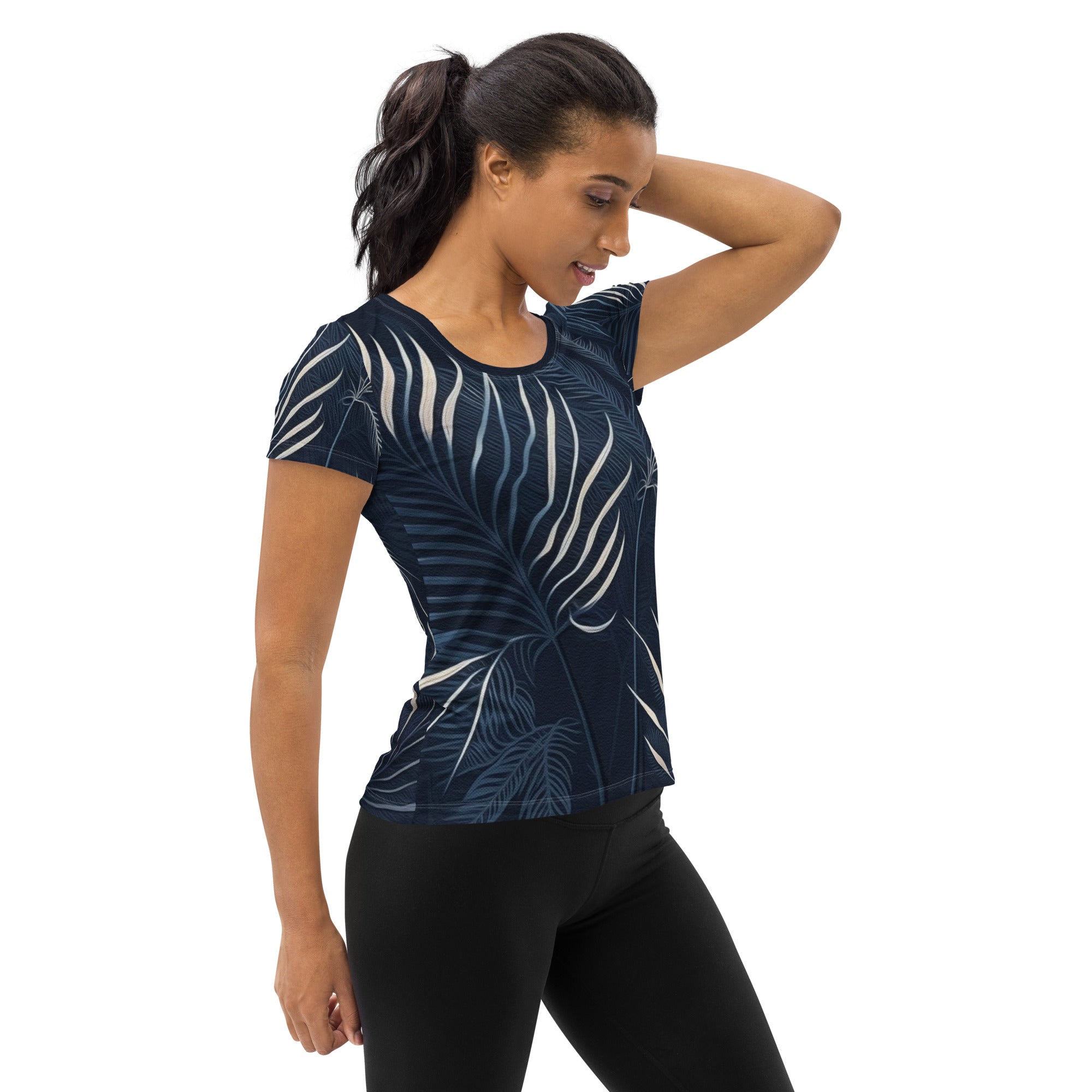 Women's Stretch Fit Athletic Sports T-shirt in blue and white palm leaves design, showcasing its soft fabric and athletic silhouette.