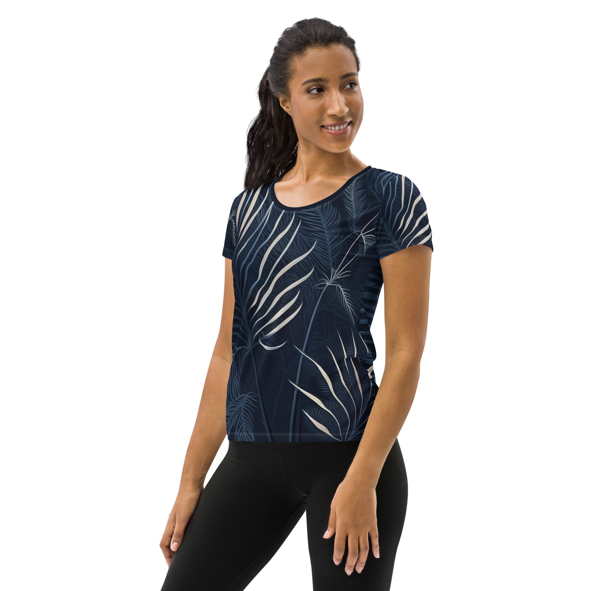 Women's Stretch Fit Athletic Sports T-shirt in blue and white palm leaves design, showcasing its soft fabric and athletic silhouette.
