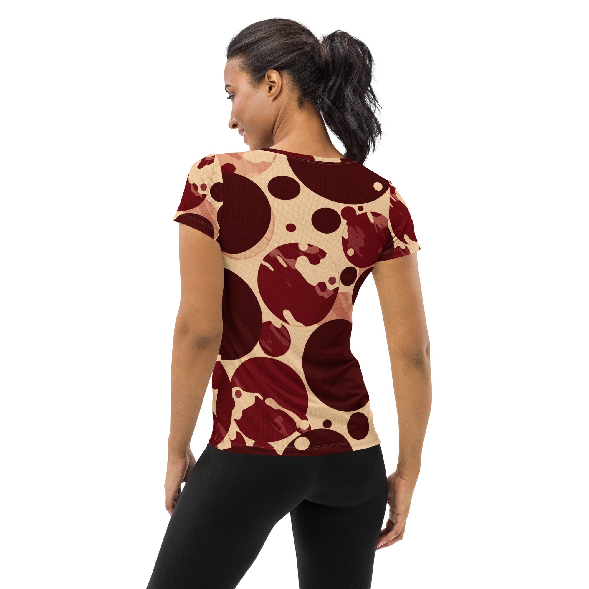 Women's Stretch Fit Athletic Sports T-shirt in Burgundy and Beige with circular spotted design, showcasing its soft fabric and athletic fit.