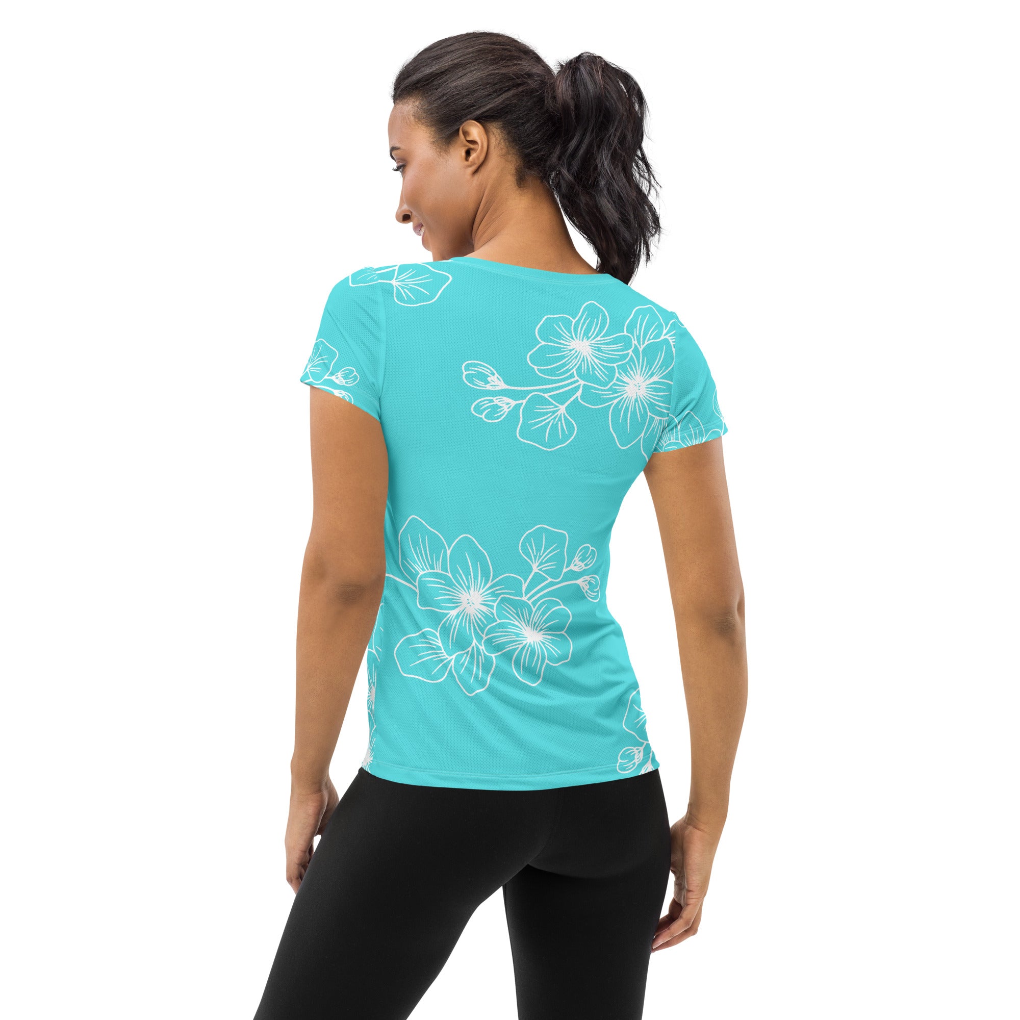 Women's Stretch Fit Athletic Sports T-shirt in Floral Cyan Blue, showcasing its soft fabric and athletic design.