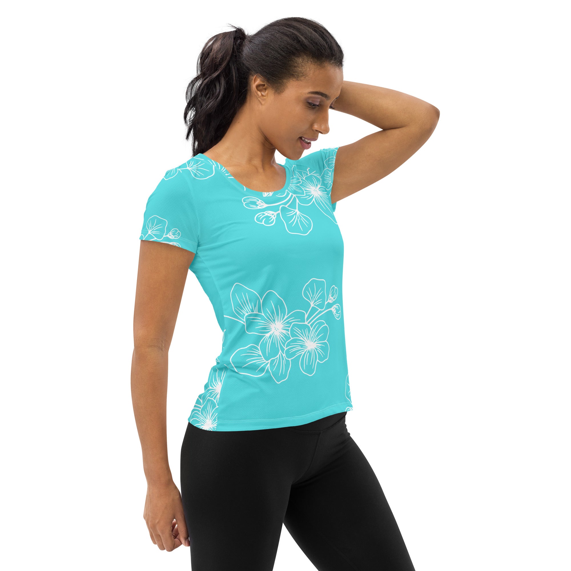 Women's Stretch Fit Athletic Sports T-shirt in Floral Cyan Blue, showcasing its soft fabric and athletic design.