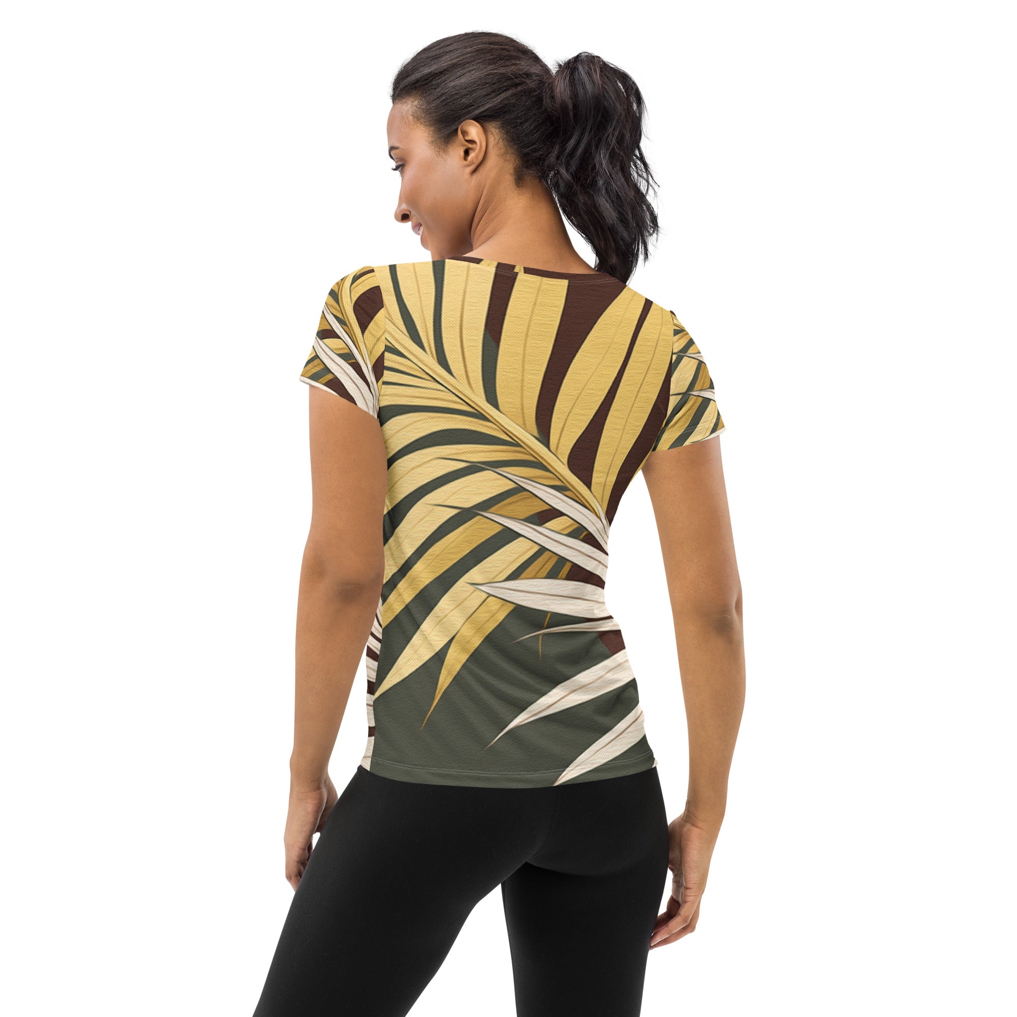 Women's Stretch Fit Athletic Sports T-shirt featuring a vibrant palm tree leaves pattern, designed for comfort and performance during workouts.
