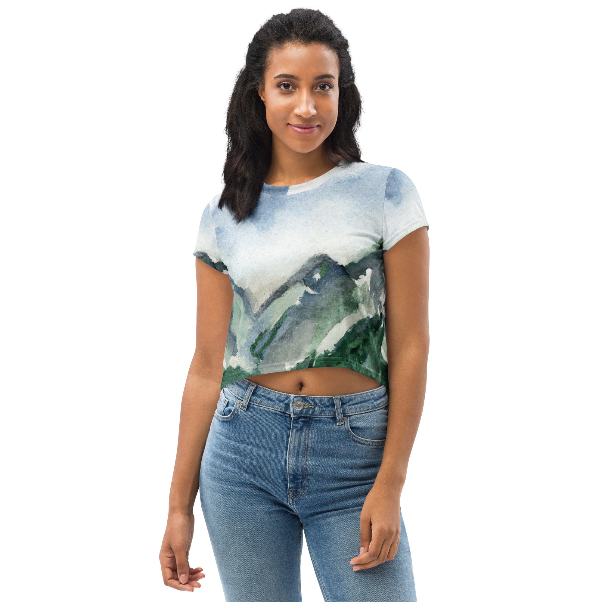 Womens Stretch Fit Crop Tee featuring a Green Mountainside Nature print with a blue sky, perfect for casual wear.
