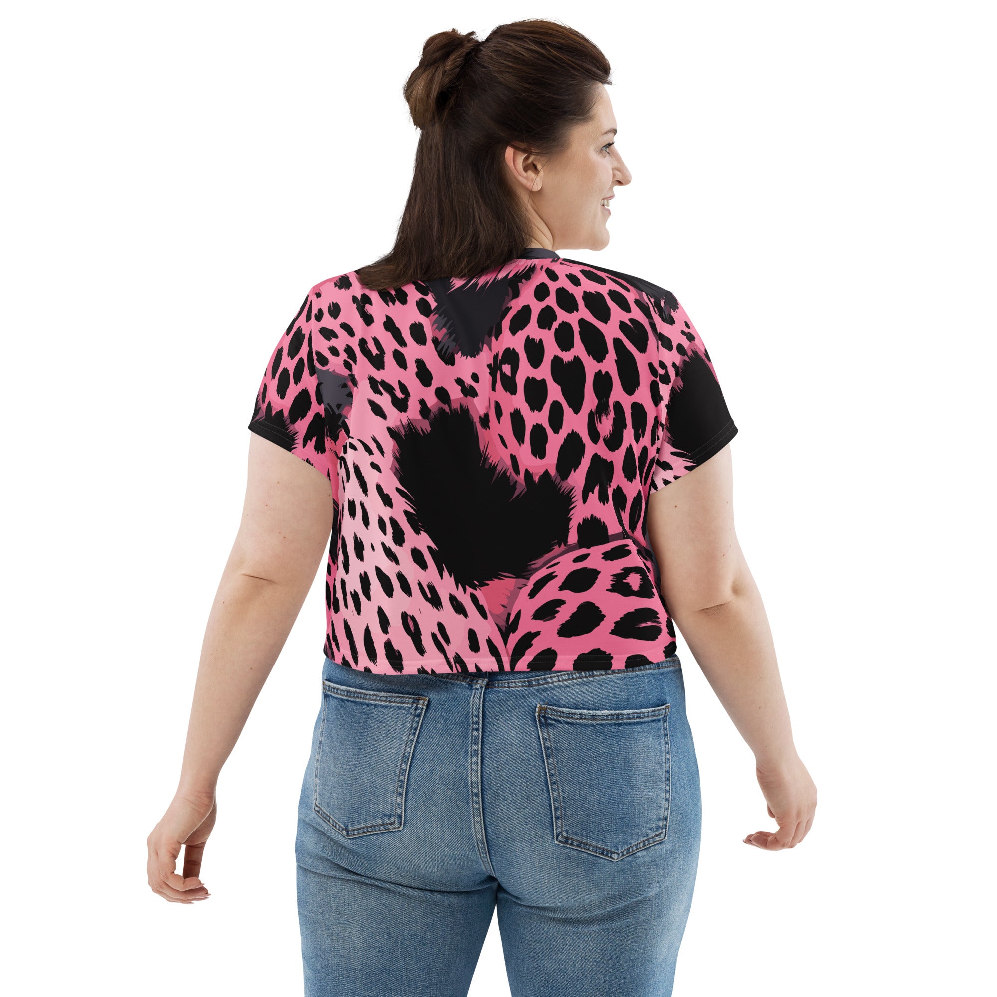 Women's Stretch Fit Crop Tee in pink and black spotted print, showcasing its stylish design and comfortable fabric.