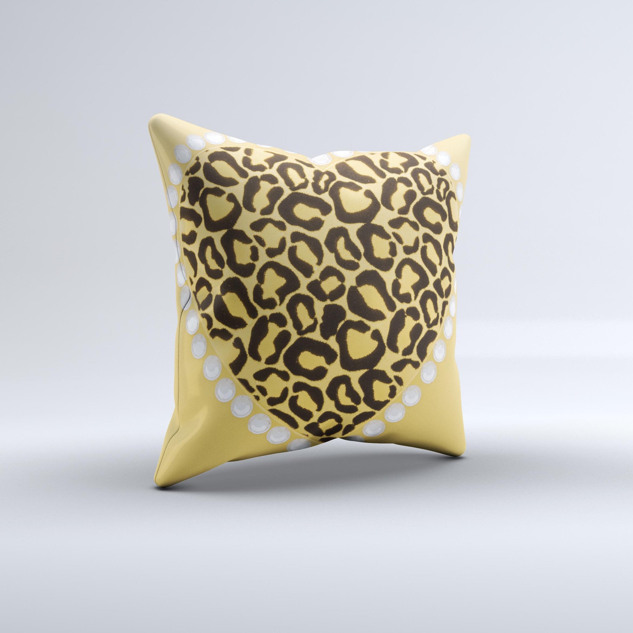Yellow heart-shaped decorative throw pillow with leopard print design, handcrafted in Virginia, showcasing unique ink-fuzed graphics.