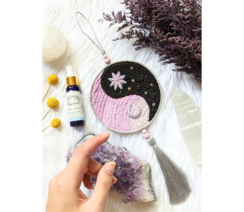Yin Yang Decorative Hanger featuring a circular design with a tassel, symbolizing balance and harmony, perfect for home decor.