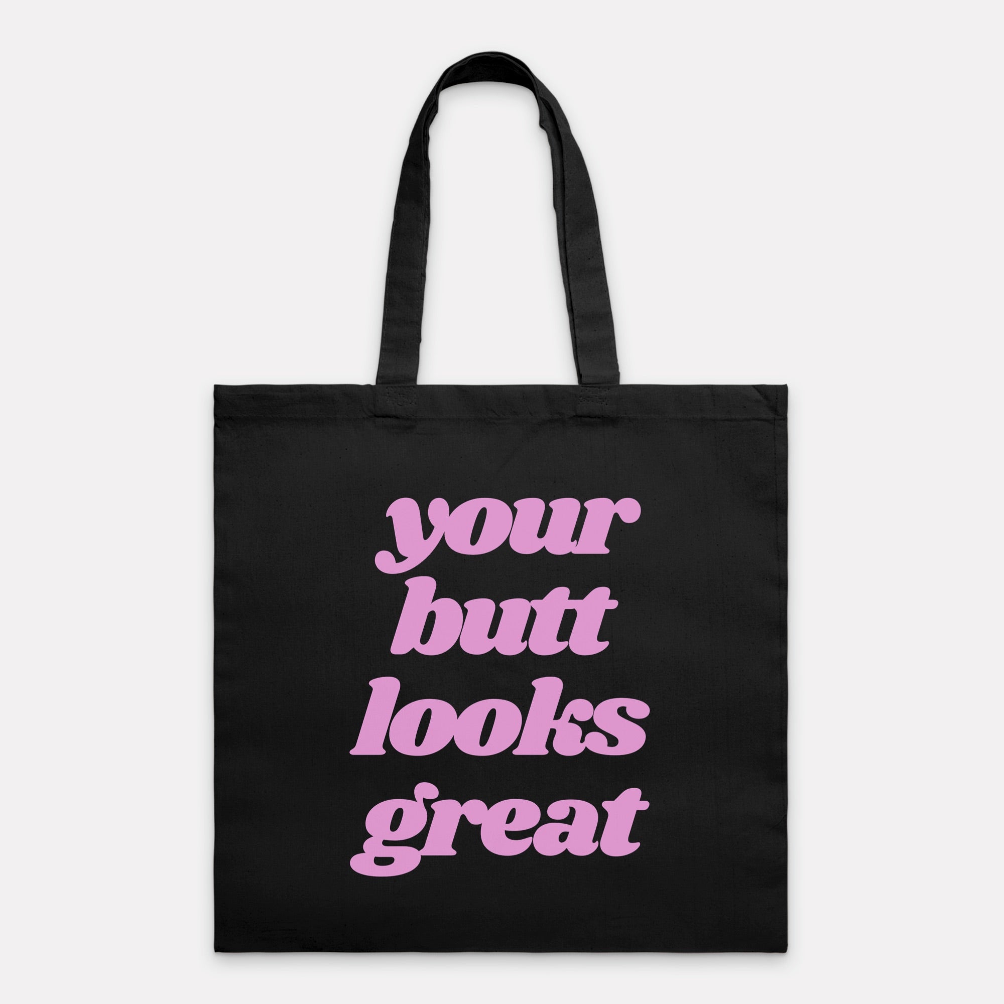 A stylish Your Butt Looks Great Tote Bag made of 100% cotton canvas, featuring a vibrant design and comfortable handles, perfect for shopping and travel.