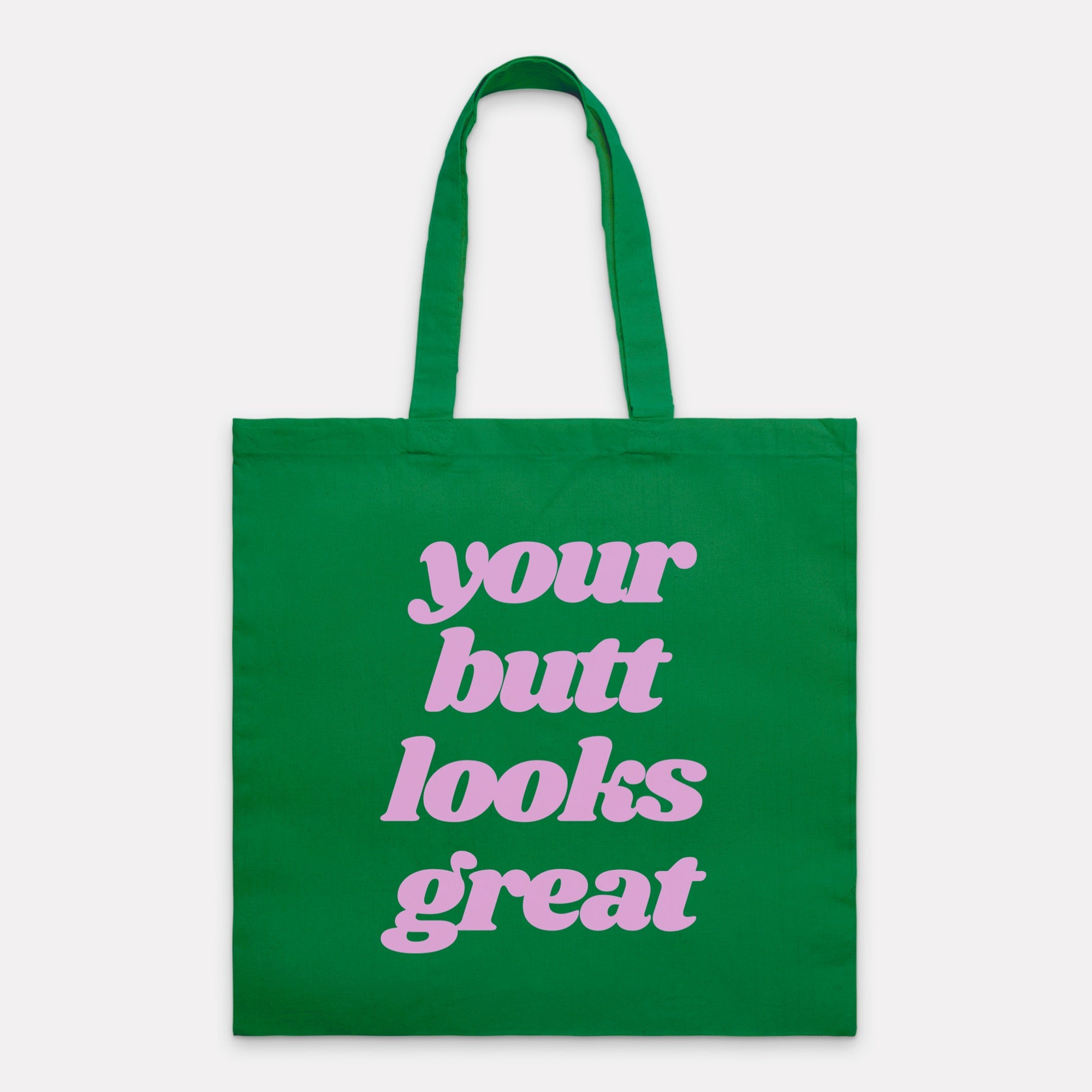 A stylish Your Butt Looks Great Tote Bag made of 100% cotton canvas, featuring a vibrant design and comfortable handles, perfect for shopping and travel.