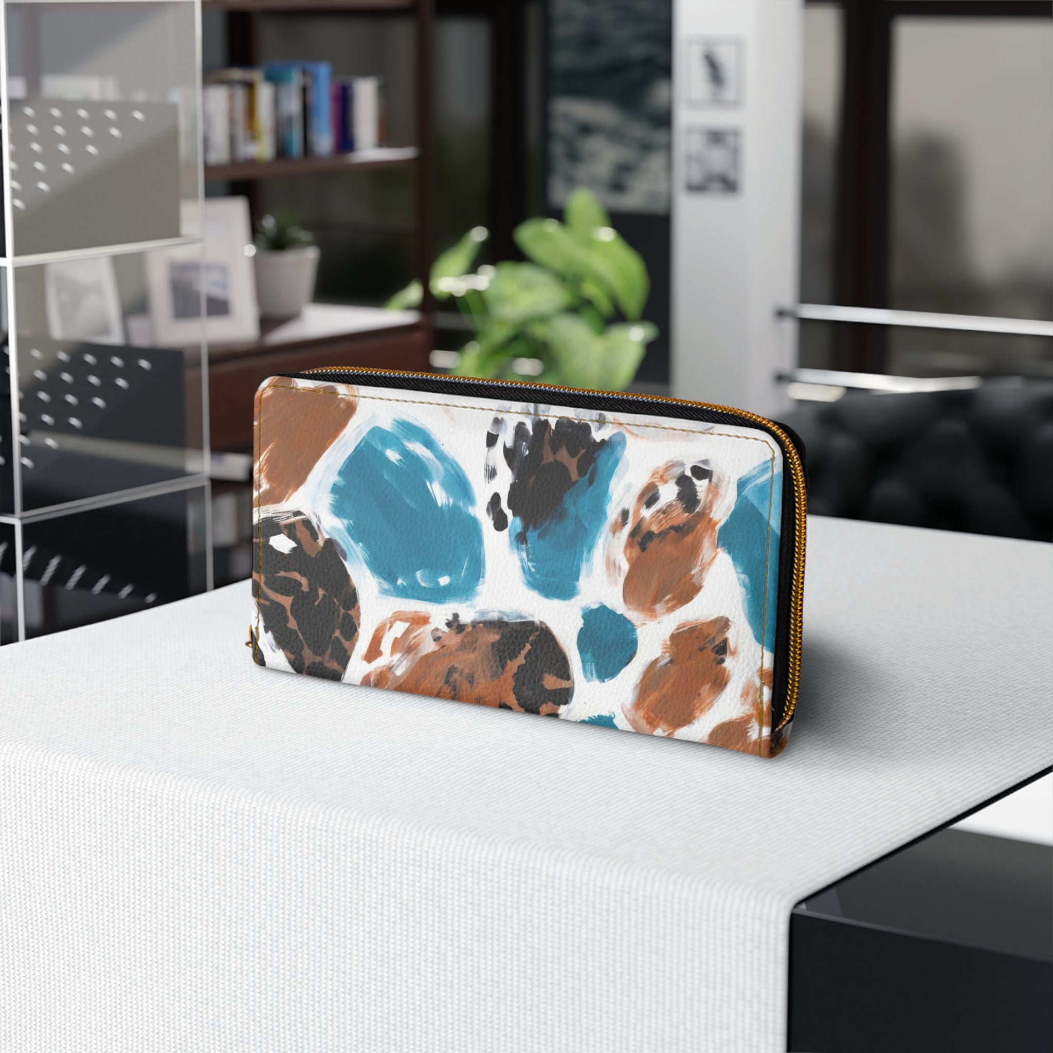 Light blue and brown spotted zipper wallet with alloy zipper and card slots.