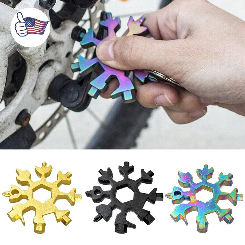 Three stainless steel snowflake-shaped multi-tools with various screwdrivers and hex wrenches, displayed with key rings.