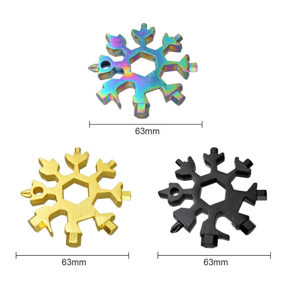 Three stainless steel snowflake-shaped multi-tools with various screwdrivers and hex wrenches, displayed with key rings.