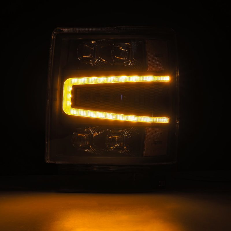 AlphaRex NOVA-Series LED projector headlights for 04-15 Chevy 1500HD in black finish, showcasing advanced lighting technology.