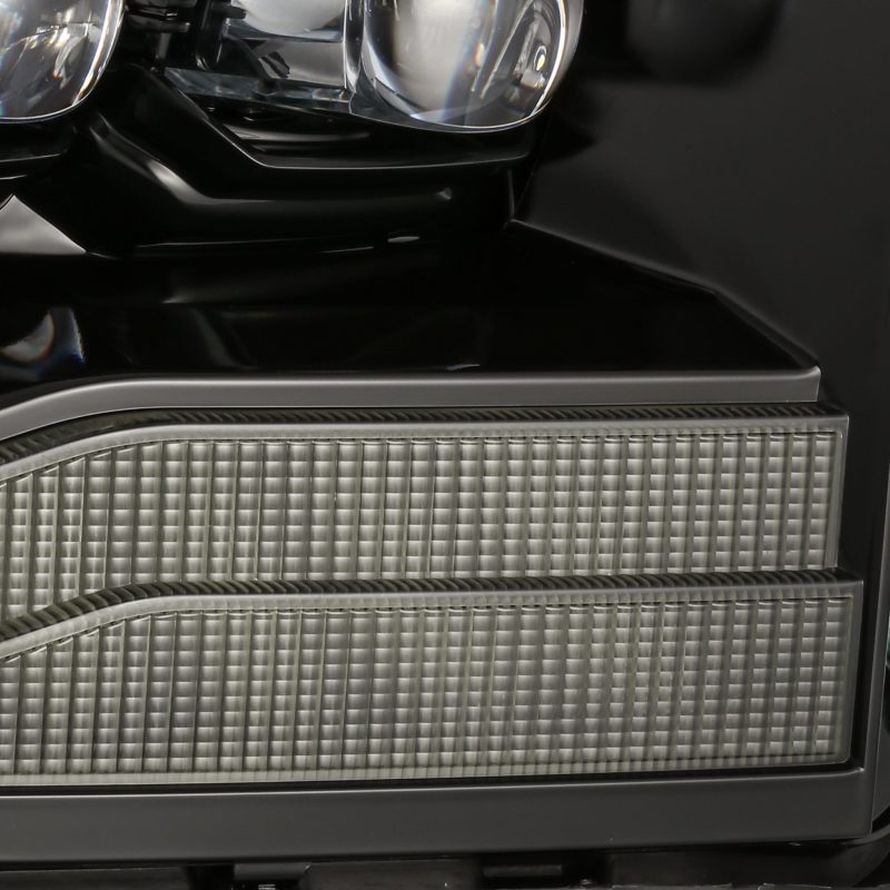 AlphaRex NOVA LED projector headlights for 06-08 Ram 1500HD, featuring Ice Cube 3D projector and Osram LED technology.