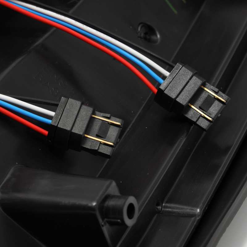 AlphaRex PRO-Series LED Tail Lights for Chevrolet Silverado 1500, featuring a sleek jet-black design and advanced LED technology.