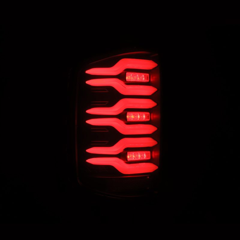 AlphaRex Luxx-Series LED Tail Lights in black for Chevrolet Silverado, showcasing modern design and advanced LED technology.