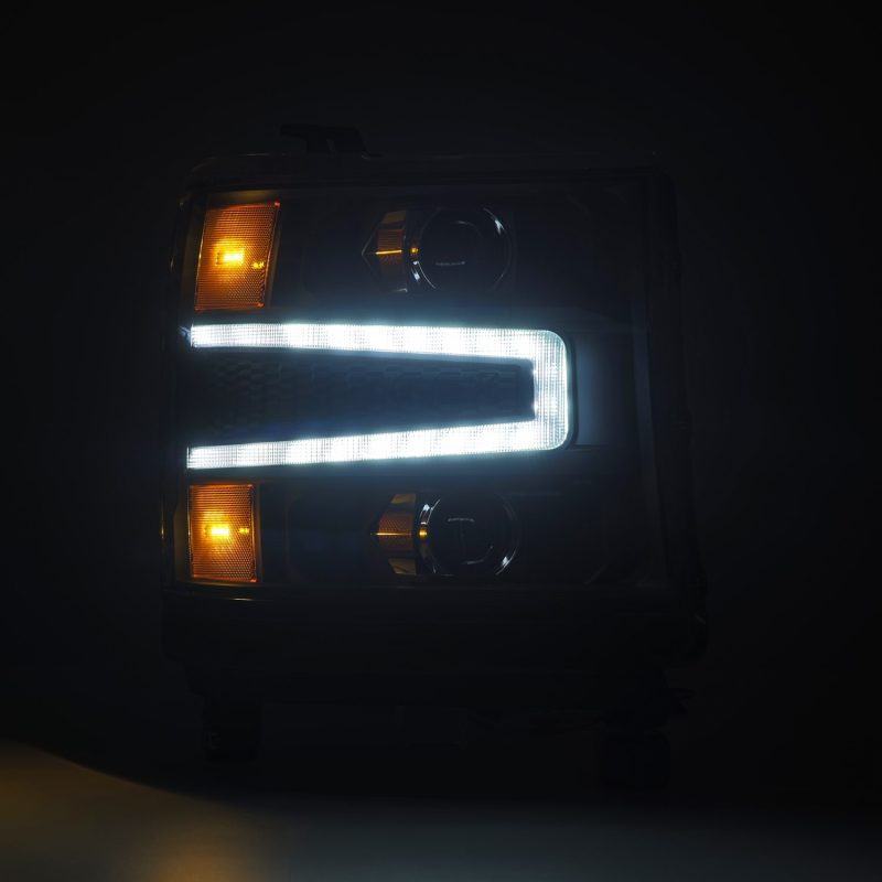 AlphaRex LUXX LED Projector Headlights for 2016-2018 Chevy Silverado 1500, featuring sleek black housing and sequential activation.