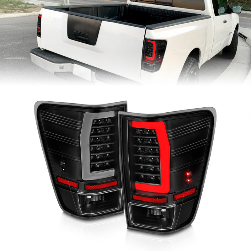 Anzo 04-15 Nissan Titan Full LED Taillights featuring black housing and clear lens, showcasing modern design and enhanced visibility.