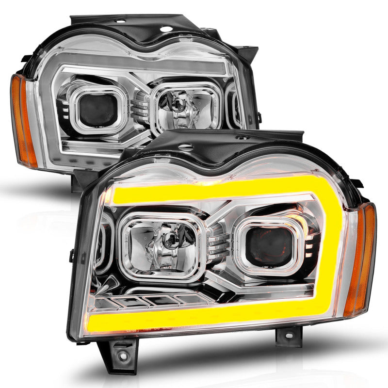 ANZO 05-07 Jeep Grand Cherokee Projector Headlights featuring a sleek design and integrated light bar.