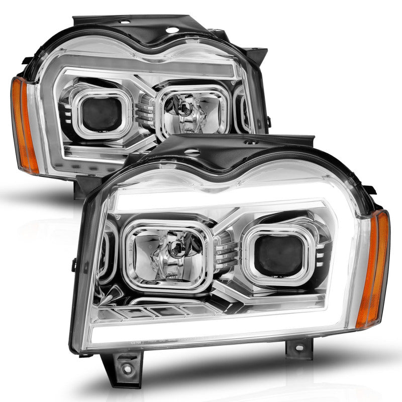 ANZO 05-07 Jeep Grand Cherokee Projector Headlights featuring a sleek design and integrated light bar.