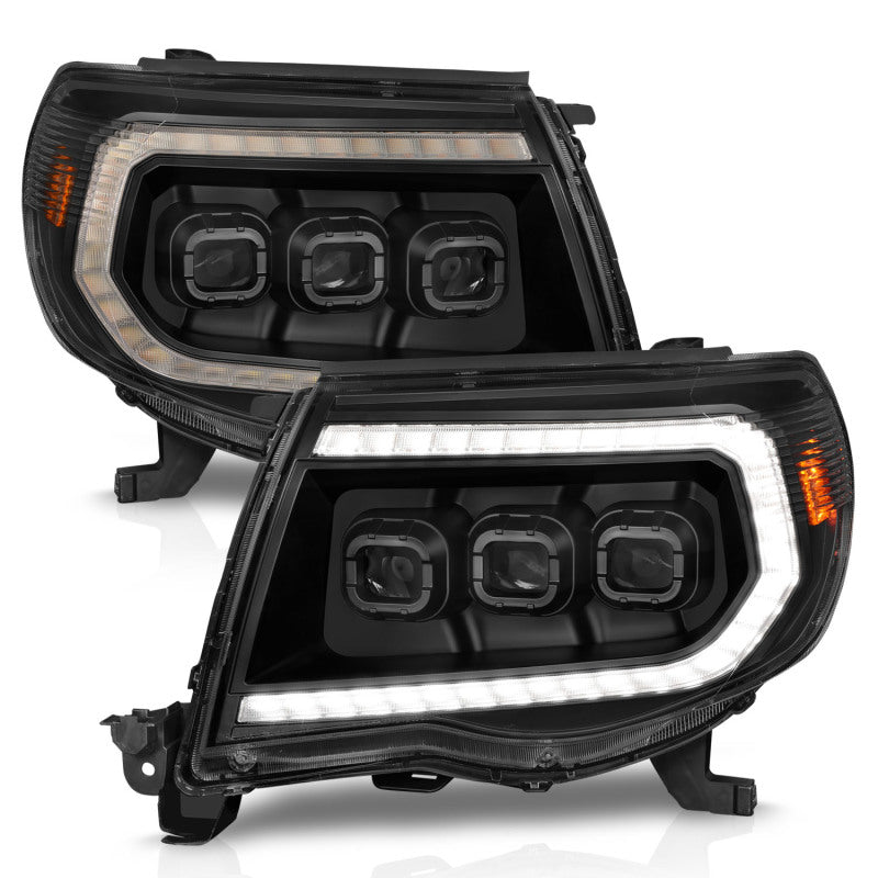 ANZO Full Projector Headlights for 2005-2011 Toyota Tacoma with light bar and sequential turn signals, showcasing modern design and enhanced visibility.