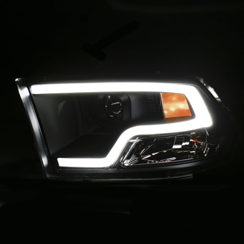 ANZO 09-18 Dodge Ram 1500 Plank Style Projector Headlights in black finish, showcasing modern design and superior lighting technology.