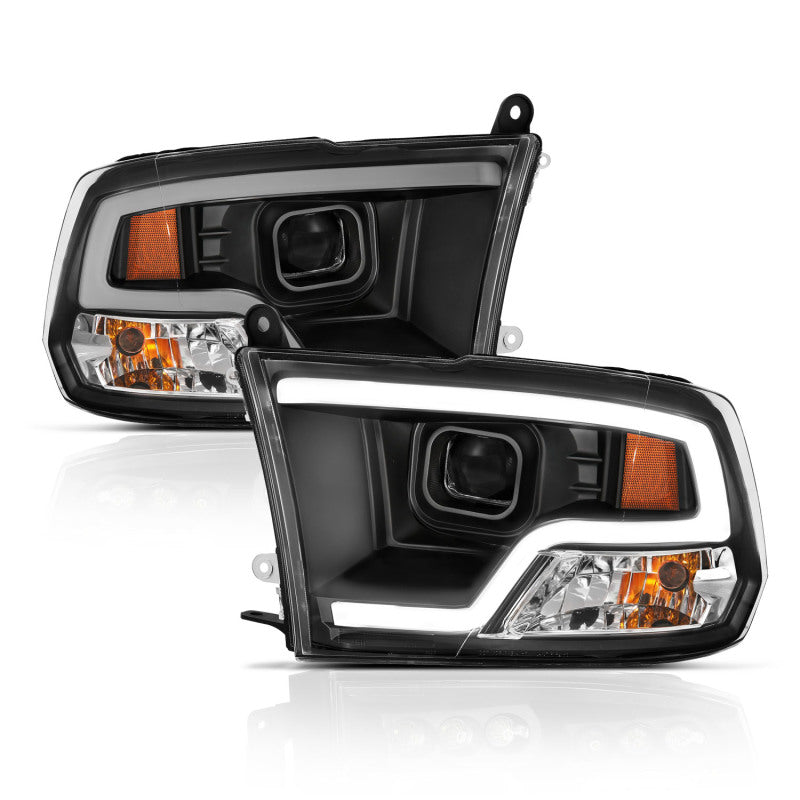 ANZO 09-18 Dodge Ram 1500 Plank Style Projector Headlights in black finish, showcasing modern design and superior lighting technology.