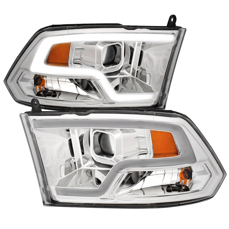 ANZO 09-18 Dodge Ram 1500 Plank Style Projector Headlights in chrome finish, showcasing innovative design and superior lighting.