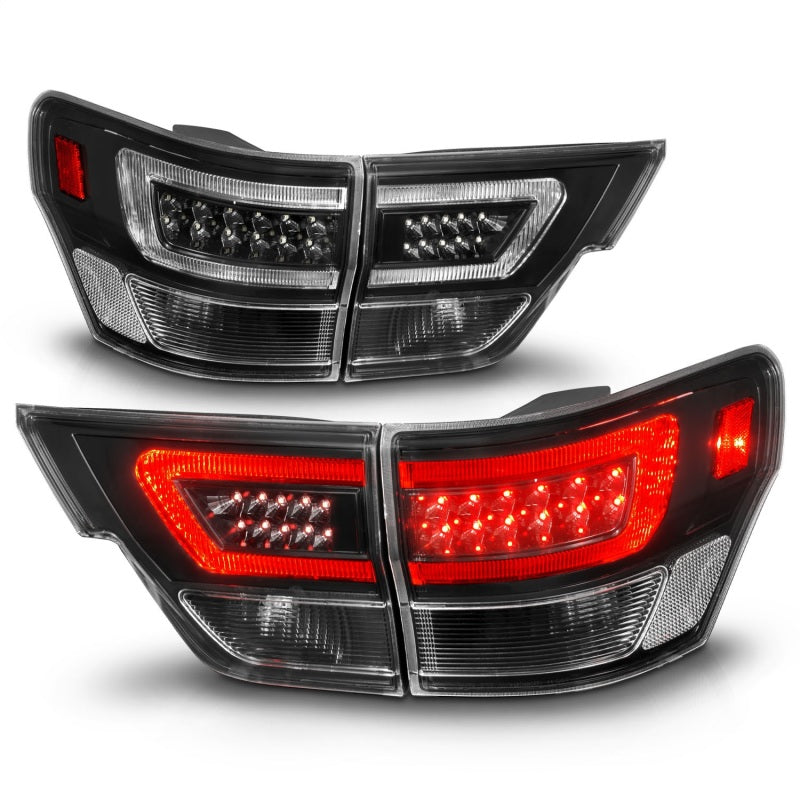 ANZO LED taillights for 2011-2013 Jeep Grand Cherokee with black housing and lightbar design.