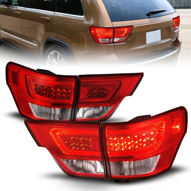 ANZO LED taillights for 2011-2013 Jeep Grand Cherokee with chrome housing and clear lens, showcasing modern design and enhanced visibility.