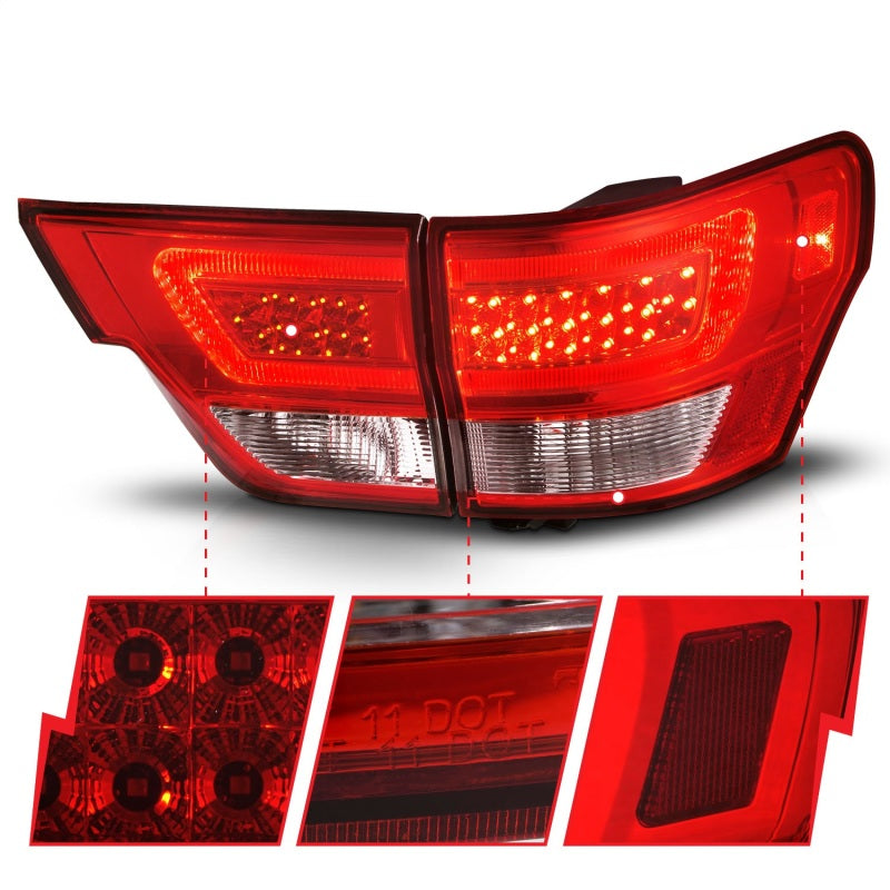 ANZO LED taillights for 2011-2013 Jeep Grand Cherokee with chrome housing and clear lens, showcasing modern design and enhanced visibility.