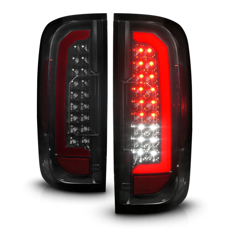 ANZO Full LED Tail Lights for GMC Canyon with black housing and red lightbar, showcasing modern design and bright illumination.