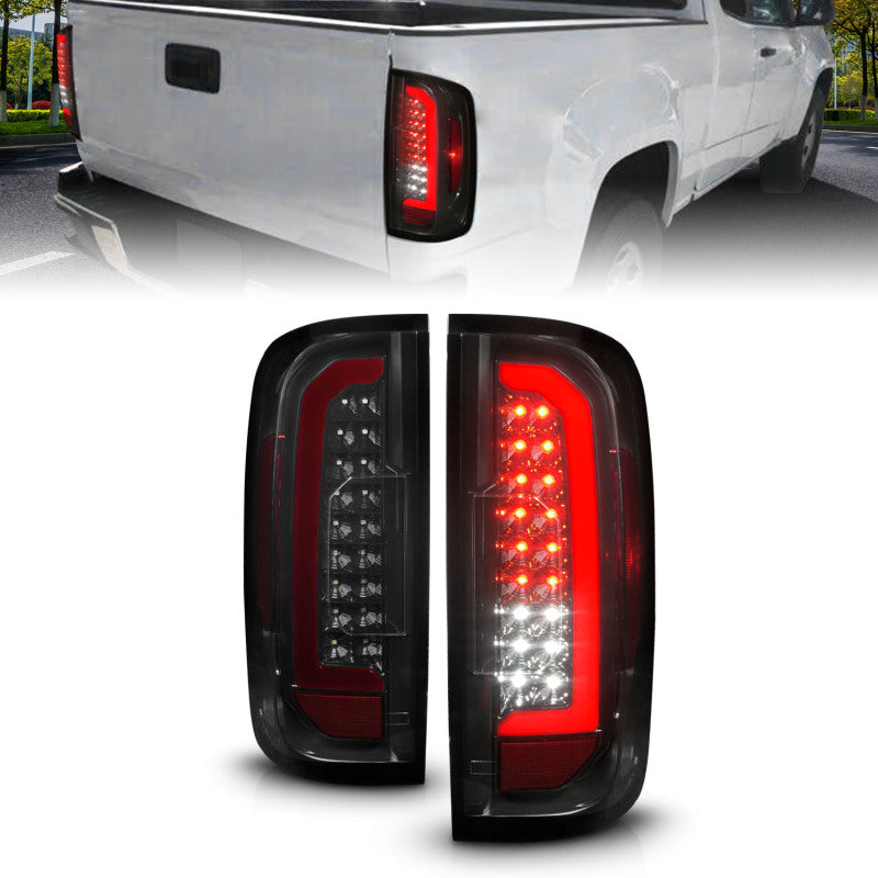 ANZO Full LED Tail Lights for GMC Canyon with black housing and red lightbar, showcasing modern design and bright illumination.