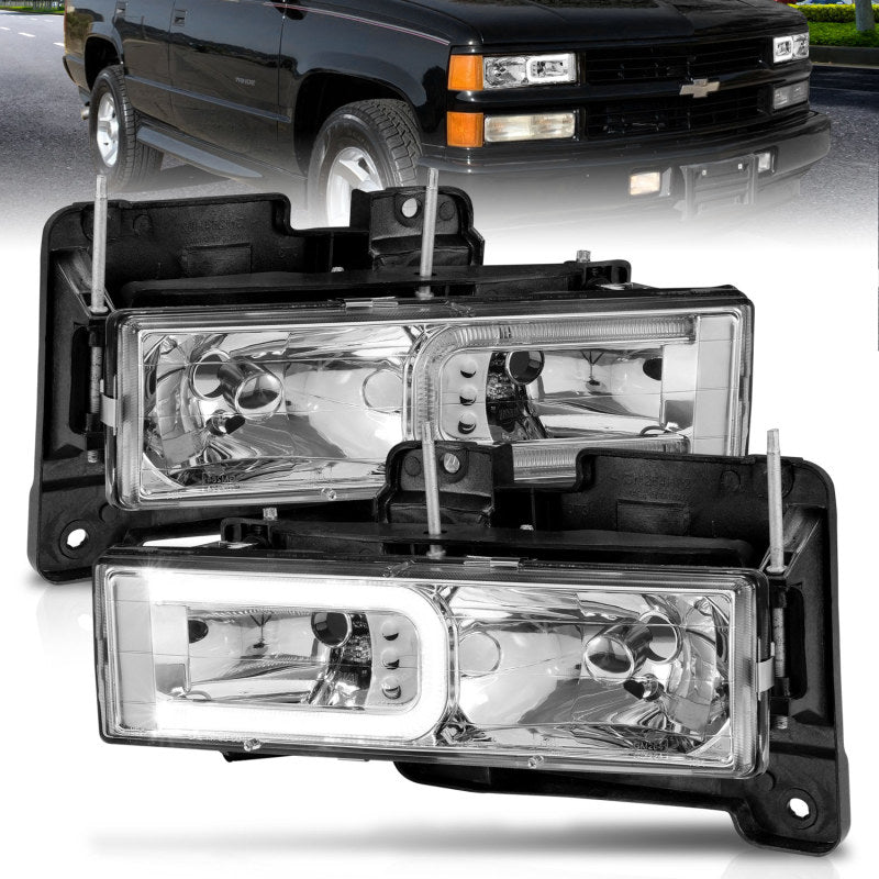 ANZO 1999-2000 Cadillac Escalade Crystal Headlights with clear lens and black housing, showcasing modern design and enhanced visibility.