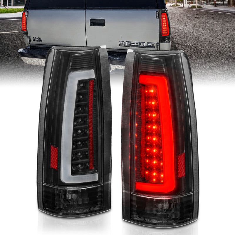 ANZO LED Taillights for 1999-2000 Cadillac Escalade with black housing and clear lens, showcasing modern design and bright LED lights.