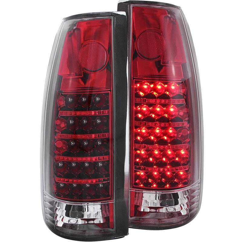 ANZO LED taillights for 1999-2000 Cadillac Escalade featuring a red and clear lens design.