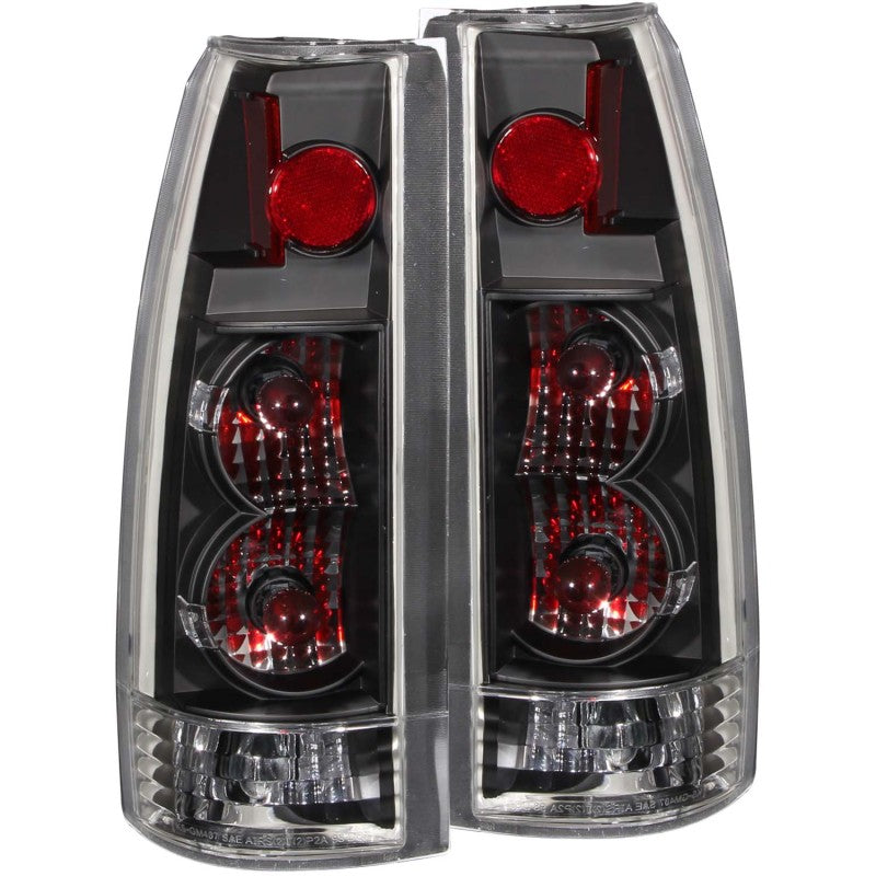 ANZO 1999-2000 Cadillac Escalade taillights featuring a clear lens and black housing, designed for improved visibility and style.