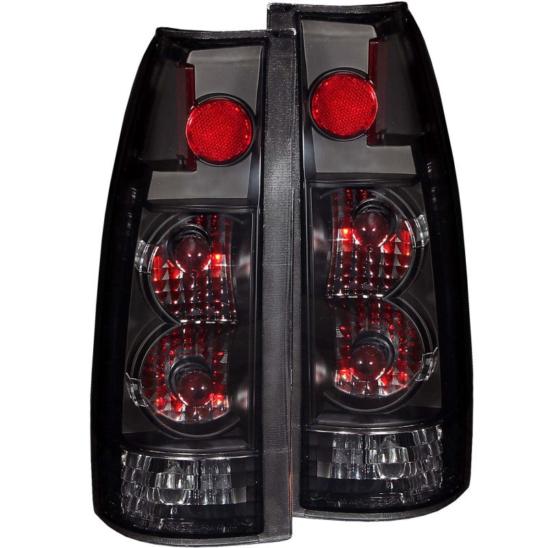 ANZO Dark Smoke G2 Taillights for 1999-2000 Cadillac Escalade, featuring a sleek design and modern dark smoke lens.