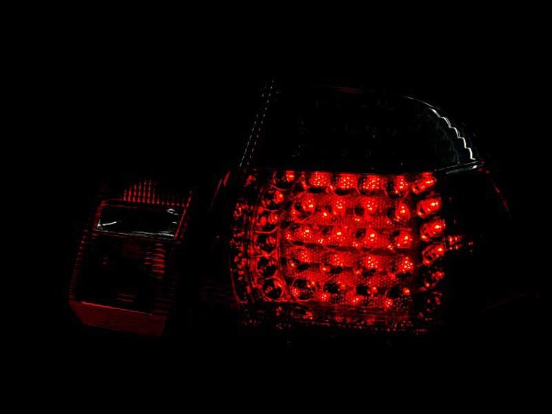ANZO LED taillights for 1999-2001 BMW 3 Series E46, featuring a red and clear lens design.