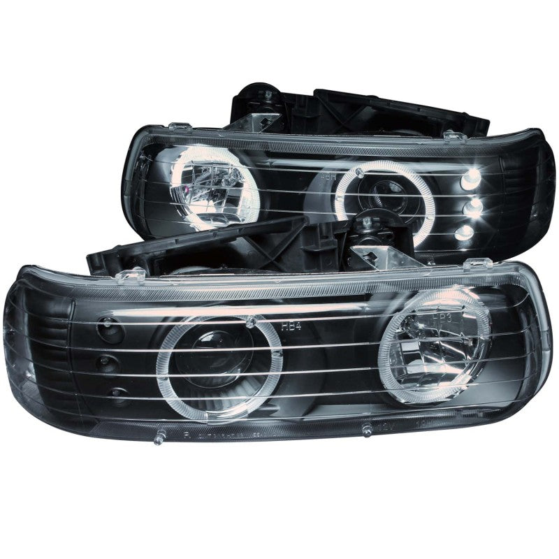 ANZO 1999-2002 Chevrolet Silverado 1500 Projector Headlights with Halo, featuring clear lens and black housing for enhanced style and visibility.