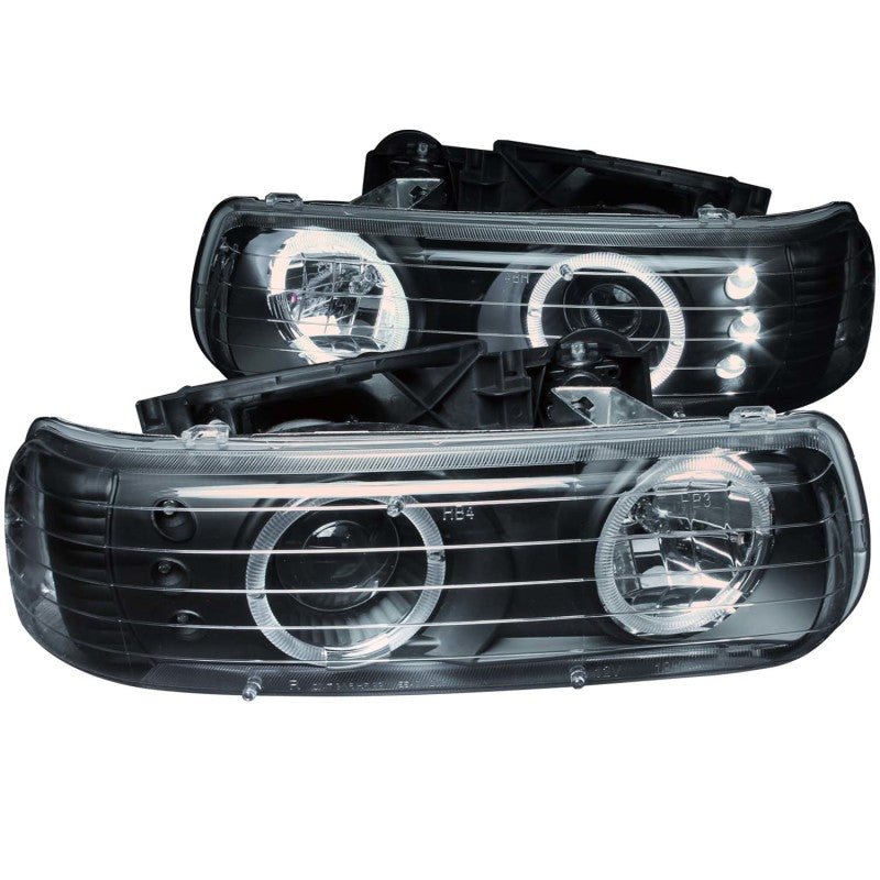 ANZO 1999-2002 Chevrolet Silverado 1500 Projector Headlights with Halo, featuring clear lens and black housing for enhanced style and visibility.