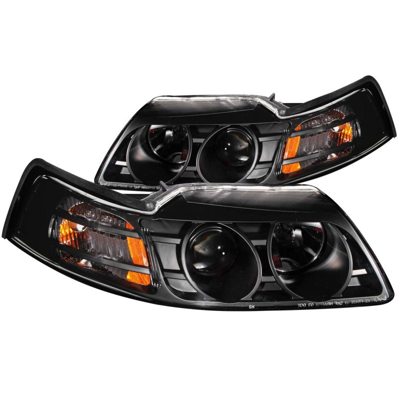 ANZO projector headlights for 1999-2004 Ford Mustang with clear lens and black housing, showcasing modern design and enhanced visibility.