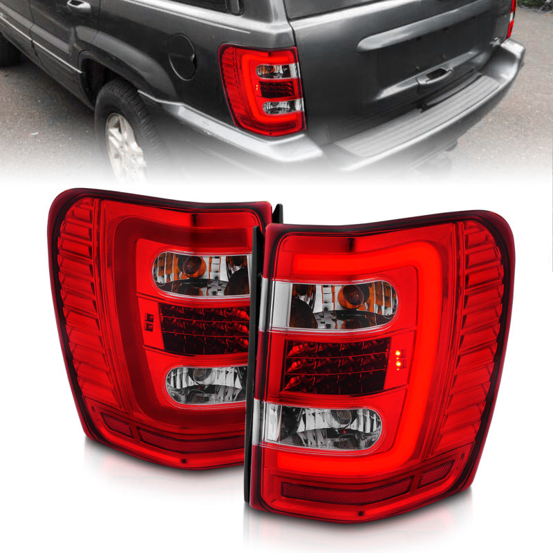ANZO LED Tail Lights for 1999-2004 Jeep Grand Cherokee with chrome finish and light bar design.
