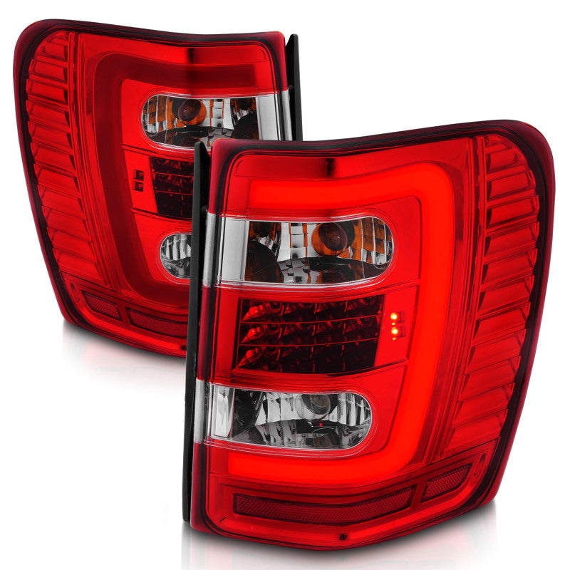 ANZO LED Tail Lights for 1999-2004 Jeep Grand Cherokee with chrome finish and light bar design.