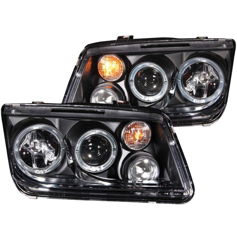 ANZO projector headlights for 1999-2005 Volkswagen Jetta with halo lights and black housing, showcasing clear lens and fog lights.