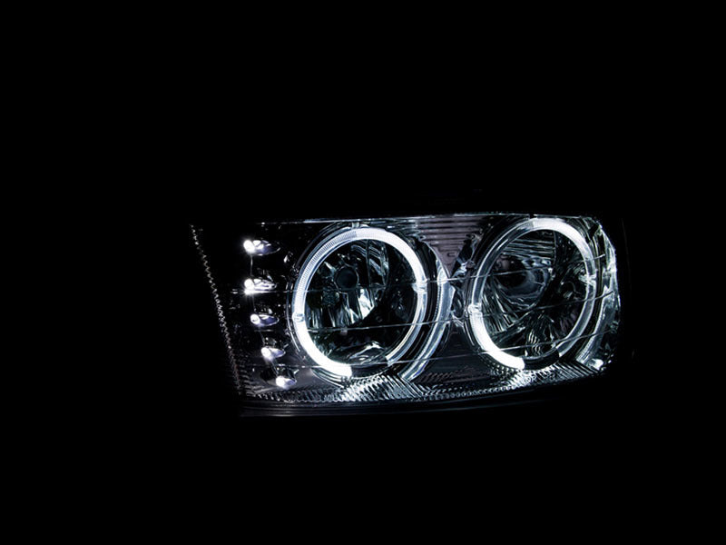 ANZO 1999-2006 GMC Sierra 1500 Crystal Headlights with Halo and LED, featuring clear lens and chrome housing for enhanced visibility and style.