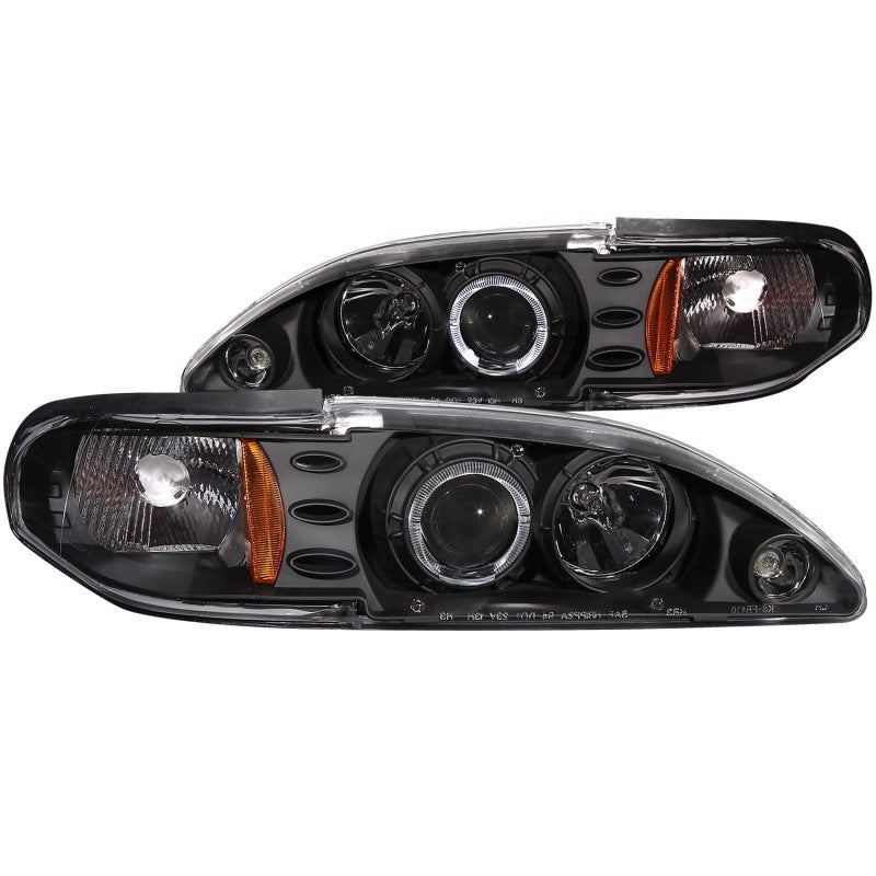 ANZO projector headlights with halo black design for 1994-1998 Ford Mustang, featuring clear lens and black housing.