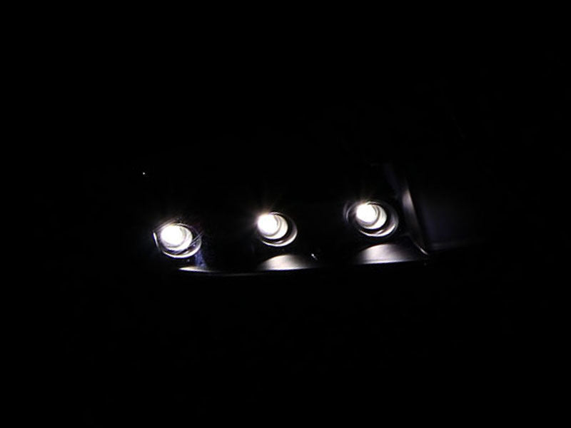 ANZO 1994-2001 Dodge Ram Crystal Headlights with clear lens and black housing, designed for improved visibility and style.