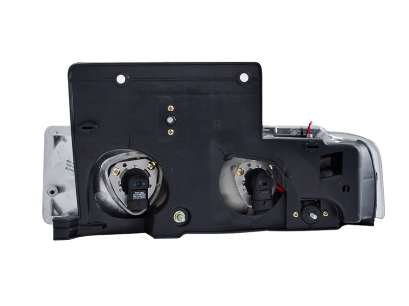 ANZO Crystal Headlights for 1995-2005 Chevrolet Astro Van with clear lens and chrome housing.